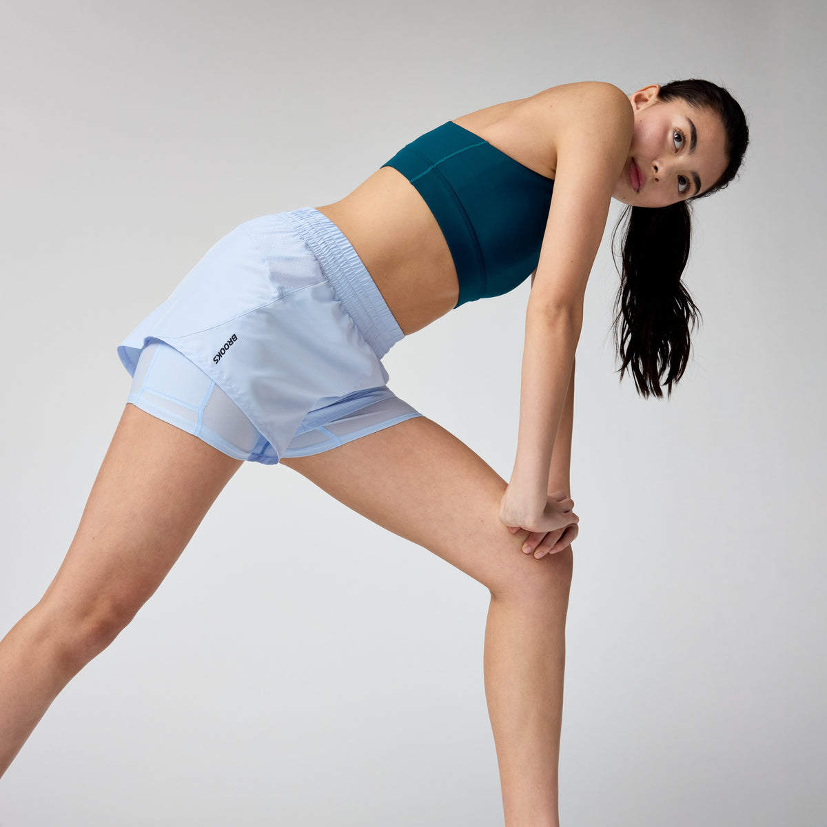 BROOKS DASH 2 EN 1 PANTALON CORTO WOMEN